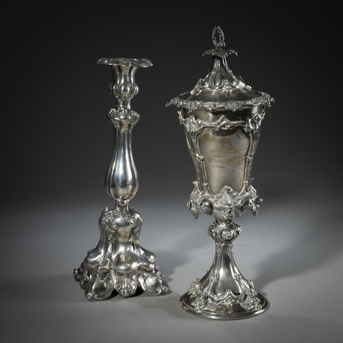 <b>A PARTIAL GILT SILVER CUP AND COVER AND A CANDLESTICK</b>