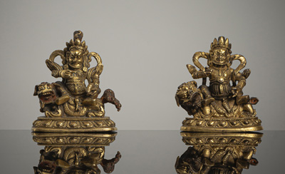 <b>Zwei feuervergoldete Bronzen des Vaishravana</b>