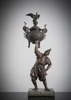 <b>A LARGE BRONZE KORO WITH AN EAGLE FINIAL HELD BY A SAMURAI</b>