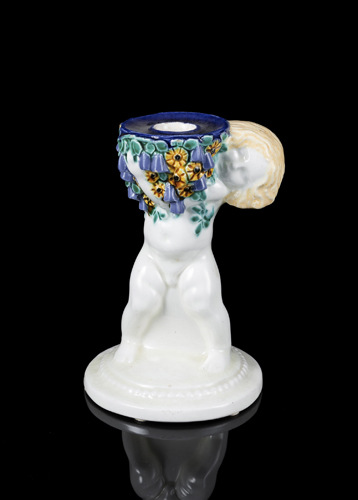 <b>PUTTO WITH FLOWERS AS CANDLESTICK</b>