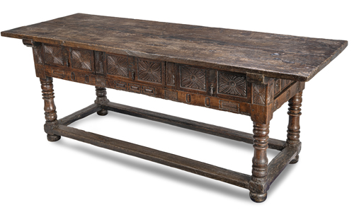 <b>A large Spanish carved fruitwood and chestnut table</b>