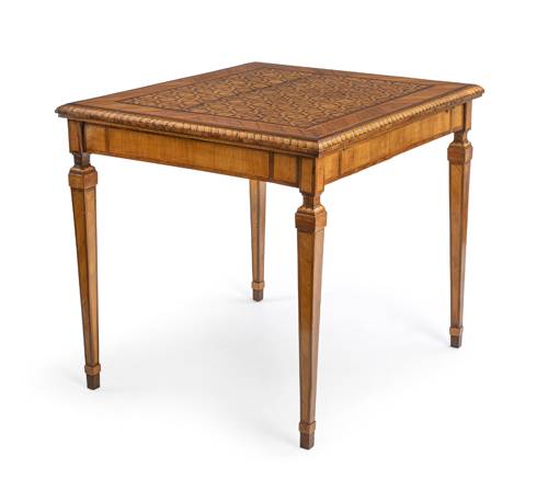 <b>A North Italian tulipwood, boxwood and fruitwood parquetry games table</b>