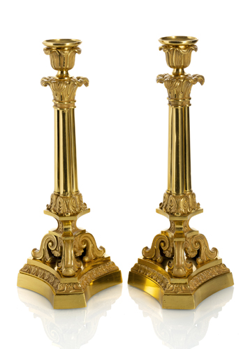 <b>A pair of Louis Philippe ormolu candlesticks</b>