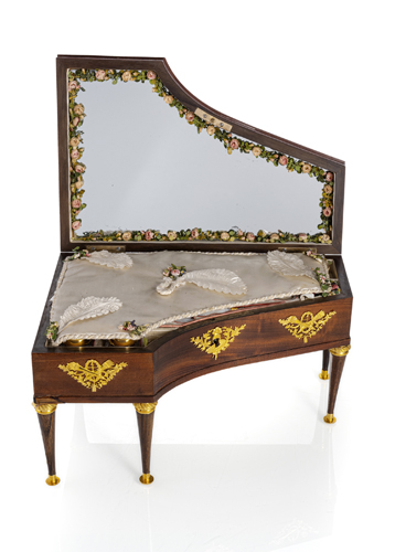 <b>An empire mahagony miniature piano forte with musical mechanism and necessaire</b>