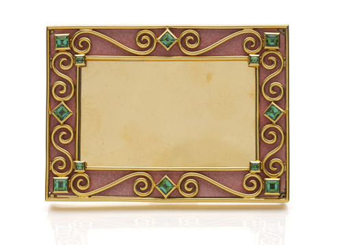 <b>A gold and gemstone photo frame</b>