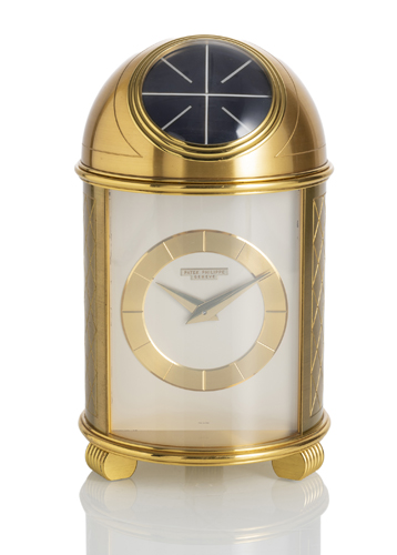 <b>A FINE SOLAR POWERED DOME SHAPED TABLE CLOCK 