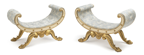<b>A pair of English white painted and parcel gilt window seats</b>
