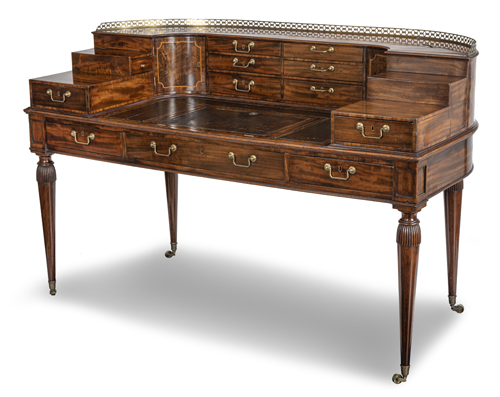 <b>A large Regency brass mounted mahogany and fruitwood Carlton House writing desk</b>
