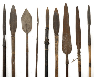 <b>A GROUP OF VARIOUS SPEARS WITH METAL BLADES, ONE WITH FLORAL DECORATION</b>