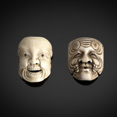 <b>TWO WELL CARVED MASK NETSUKE, ONE MADE OF IVORY</b>