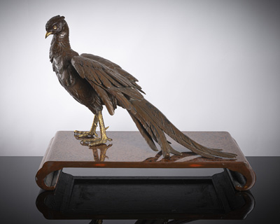 <b>A large and fine bronze in the shape of a pheasant on a lacquer base</b>