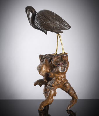 <b>A large bronze sculpture of a heron on a root wood base with details in gold, shakudo and silver</b>