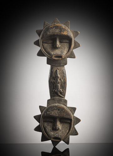 <b>A carved wood double mask</b> <b>A carved wood double mask</b>