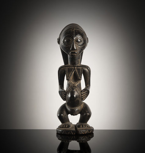 <b>A finely carved female wood figure</b> <b>A finely carved female wood figure</b>