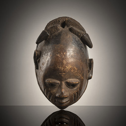 <b>A headdress wood mask</b> <b>A headdress wood mask</b>