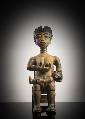<b>A large wood mother figure</b> <b>A large wood mother figure</b>