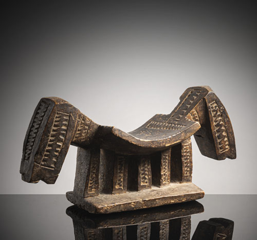 <b>A Dogon wood headrest</b> <b>A Dogon wood headrest</b>
