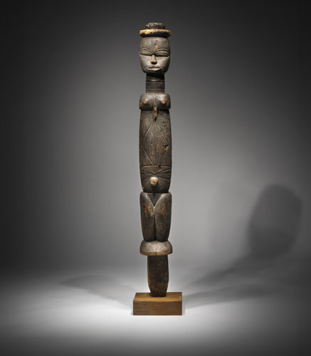 <b>A carved wood staff figure</b> <b>A carved wood staff figure</b>