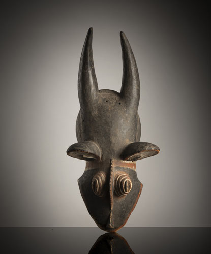 <b>A zoomorphic wood mask</b> <b>A zoomorphic wood mask</b>