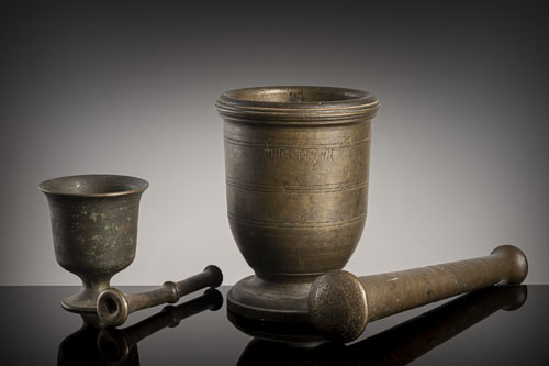 <b>Two mortars with bronze pestles</b> <b>Two mortars with bronze pestles</b>